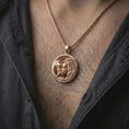 Load image into Gallery viewer, Rose gold plated lion and bear family pendant necklace worn on the neck, presented in a close-up lifestyle shot with a refined symbolic aesthetic.