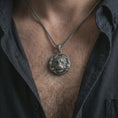 Load image into Gallery viewer, A tiger pendant worn on the neck in an oxidized finish, bold animal spirit styling with strong contrast and depth.