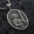 Load image into Gallery viewer, Sterling silver Saint Martin of Tours pendant necklace with an oxidized finish resting on textured volcanic rock, captured in a close-up premium studio composition.