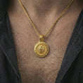 Load image into Gallery viewer, Gold plated Viking lion medallion pendant necklace worn on the neck, captured on a human model in a premium dark-toned lifestyle frame.