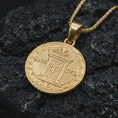 Load image into Gallery viewer, Gold plated Pope Innocent coin pendant necklace photographed on porous black volcanic stone, emphasizing the Vatican-inspired coin portrait and classical inscription in a luxury jewelry composition.