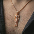 Load image into Gallery viewer, Rose gold plated Ra amulet pendant necklace worn on the neck, presented in an elegant model photograph with a timeless Egyptian and collector-inspired aesthetic.