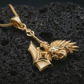 Load image into Gallery viewer, Gold plated paladin hammer pendant necklace presented on porous volcanic rock, highlighting the fantasy warrior design in a luxurious close-up jewelry image.