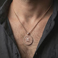 Load image into Gallery viewer, Rose gold plated cursed Aztec coin pendant necklace worn on the neck, presented in a close-up lifestyle shot with a refined gothic pirate-inspired look.