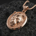 Load image into Gallery viewer, Rose gold plated lioness pendant necklace on dark volcanic rock, photographed in a detailed premium studio macro view.