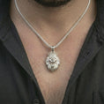 Load image into Gallery viewer, Polished silver crowned lion head pendant necklace worn on the neck, shown against the chest in a clean and striking everyday wear composition.
