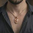 Load image into Gallery viewer, Rose gold plated roaring bear shield pendant necklace worn on the neck, presented in a close-up lifestyle shot with a refined Nordic aesthetic.
