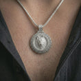 Load image into Gallery viewer, Polished silver Fenrir wolf pendant necklace worn on the neck, shown against the chest in a clean and striking everyday wear composition.