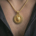 Load image into Gallery viewer, Gold plated Fenrir wolf pendant necklace worn on the neck, captured on a human model in a premium dark-toned lifestyle frame.