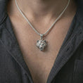 Load image into Gallery viewer, Polished silver 3D lioness pendant necklace worn on the neck, shown against the chest in a clean and striking everyday wear composition.