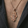 Load image into Gallery viewer, Rose gold plated Good Shepherd cross pendant necklace worn on the chest, close-up lifestyle shot featuring the sacred Good Shepherd design with warm rose gold tones.