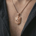 Load image into Gallery viewer, Rose gold plated knight shield pendant necklace worn on the chest, close-up lifestyle shot featuring the gothic knight shield design with warm rose gold tones.