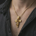 Load image into Gallery viewer, Gold plated Jesus cross pendant necklace worn on the chest, premium lifestyle jewelry photo with the wooden textured Jesus cross centered on a spiga chain.