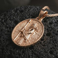 Load image into Gallery viewer, Rose gold plated Achaemenid soldier pendant necklace on dark volcanic rock, shown in a detailed premium macro view with the regal soldier relief and textured antique-inspired frame.