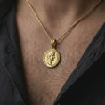 Load image into Gallery viewer, Gold plated Tiberius coin pendant necklace worn on the neck, captured in a premium lifestyle composition that highlights the antique emperor portrait as a distinctive historical jewelry accent.