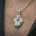 Load image into Gallery viewer, Polished silver Tutankhamun pendant necklace worn on the neck, shown in a clean model shot with the ancient king bust centered for a refined mythology-inspired look.