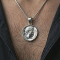 Load image into Gallery viewer, Polished silver Emperor Augustus coin pendant necklace worn on the neck, shown in a clean model shot with the classical emperor medallion centered for a refined antiquity-inspired look.