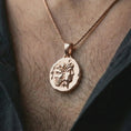 Load image into Gallery viewer, Rose gold plated Janus coin pendant necklace worn on the neck, presented in an elegant model photograph with a timeless mythology and collector-inspired aesthetic.