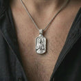 Load image into Gallery viewer, Polished silver Joan of Arc dog tag pendant necklace worn on the neck, shown in a clean model shot with the detailed saint portrait centered for a timeless devotional look.