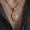 Load image into Gallery viewer, Rose gold plated Saint Paul pendant necklace worn on the chest, close-up lifestyle shot featuring the sacred Saint Paul design with warm rose gold tones.