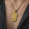 Load image into Gallery viewer, Gold plated Saint Joseph and Jesus pendant necklace worn on the chest, premium lifestyle jewelry photo with the Catholic Saint Joseph medal centered on a spiga chain.