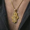 Load image into Gallery viewer, Gold plated Good Shepherd cross pendant necklace worn on the chest, premium lifestyle jewelry photo with the Good Shepherd cross pendant centered on a spiga chain.