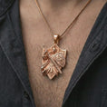 Load image into Gallery viewer, Rose gold plated warrior pendant worn on the chest, close-up editorial composition with realistic metal texture and depth.