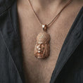 Load image into Gallery viewer, Rose gold plated feather headdress chief pendant necklace worn on the chest, close-up lifestyle shot featuring the feather headdress design with warm rose gold tones.