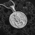 Load image into Gallery viewer, Polished silver Masonic double headed eagle pendant necklace on textured volcanic rock, centered macro jewelry photo with detailed Scottish Rite relief and bright silver highlights.