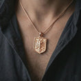 Load image into Gallery viewer, Rose gold plated double-headed eagle shield pendant necklace worn on the chest, close-up lifestyle shot featuring the double-headed eagle crest with warm rose gold tones.