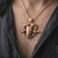 Load image into Gallery viewer, Rose gold plated ram skull pendant necklace worn on the chest, close-up lifestyle shot featuring the gothic ram skull design with warm rose gold tones.