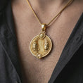 Load image into Gallery viewer, Gold plated Pisces zodiac pendant necklace worn on the chest, premium lifestyle jewelry photo with the Pisces twin fish pendant centered on a spiga chain.