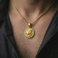 Load image into Gallery viewer, Gold plated lotus flower pendant necklace worn on the chest, premium lifestyle jewelry photo with the yoga-inspired lotus pendant centered on a spiga chain.