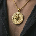 Load image into Gallery viewer, Gold plated Greek compass pendant necklace worn on the chest, premium lifestyle jewelry photo with the directional compass pendant centered on a spiga chain.