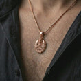 Load image into Gallery viewer, Rose gold plated owl all-seeing eye pendant necklace worn on the chest, close-up lifestyle shot featuring the symbolic owl and all-seeing eye design with warm rose gold tones.