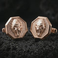 Load image into Gallery viewer, Rose gold plated gorilla cufflinks on textured volcanic rock, detailed macro product shot with soft warm reflections and powerful gorilla symbolism.
