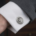 Load image into Gallery viewer, Oxidized Saint Joseph cufflinks worn on a white dress shirt cuff beneath a tailored suit sleeve in a refined lifestyle photograph, emphasizing timeless Christian elegance.