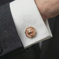 Load image into Gallery viewer, A rose gold plated tiger head cufflink is worn on a shirt cuff in a close-up lifestyle composition, highlighting its octagon frame and fierce tiger design.