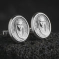Load image into Gallery viewer, Polished silver Virgin Mary cufflinks are displayed on black volcanic rock in a premium macro studio close-up with detailed Catholic devotional artwork.