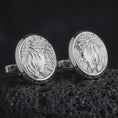 Load image into Gallery viewer, Polished silver Jesus Crown of Thorns cufflinks are displayed on black volcanic rock in a premium macro studio close-up with detailed Christian devotional artwork.