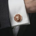 Load image into Gallery viewer, A rose gold plated fox head cufflink is worn on a shirt cuff in a close-up lifestyle composition, highlighting its octagon frame and sculpted fox design.