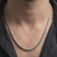 Load image into Gallery viewer, Polished silver box chain worn close to the neck, showing its crisp link geometry and refined masculine finish.