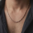 Load image into Gallery viewer, Rose gold plated Greek key chain worn on the neck in a lifestyle close-up, showing the geometric link rhythm and decorative Greek-inspired detail.