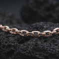 Load image into Gallery viewer, Rose gold plated mariner chain necklace on black stone, showing warm metal tone against the rugged link pattern.