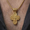 Load image into Gallery viewer, A gold plated double sided Christian cross pendant is worn on the neck, highlighting the archangel motif, symbolic spiritual protection theme, and substantial cross silhouette in a refined close-up lifestyle shot.