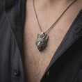 Load image into Gallery viewer, Oxidized sterling silver fox necklace worn on the chest, showing the detailed fox head, pointed ears, layered fur, and symbolic woodland animal design.