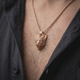 Load image into Gallery viewer, Rose gold plated fox head pendant worn on the chest, showcasing the sculpted fox face, flowing fur texture, upright ears, and distinctive wildlife necklace design.