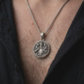 Load image into Gallery viewer, Oxidized sterling silver knight protecting children necklace worn on the chest, showing the armored guardian, two children, detailed medieval helmet, and meaningful fatherhood-inspired jewelry design.
