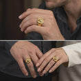 Load image into Gallery viewer, Gold plated 925 sterling silver matching roaring bear rings worn on the fingers of a man and woman together, featuring raised wildlife portraits, powerful bear expressions, engraved fur details, and coordinated warm gold plated finishes.