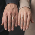 Load image into Gallery viewer, Rose gold plated 925 sterling silver matching Aztec Mayan wedding bands worn on the fingers of a man and woman together, highlighting detailed geometric figures, ancient-inspired ornamental engravings, and matching rose gold finishes.